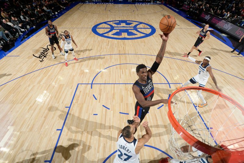 DETROIT, MI - JANUARY 17: Jalen Duren #0 of the Detroit Pistons drives to the basket during the game against the Minnesota Timberwolves on January 17, 2024 at Little Caesars Arena in Detroit, Michigan. NOTE TO USER: User expressly acknowledges and agrees that, by downloading and/or using this photograph, User is consenting to the terms and conditions of the Getty Images License Agreement. Mandatory Copyright Notice: Copyright 2024 NBAE (Photo by Chris Schwegler/NBAE via Getty Images)