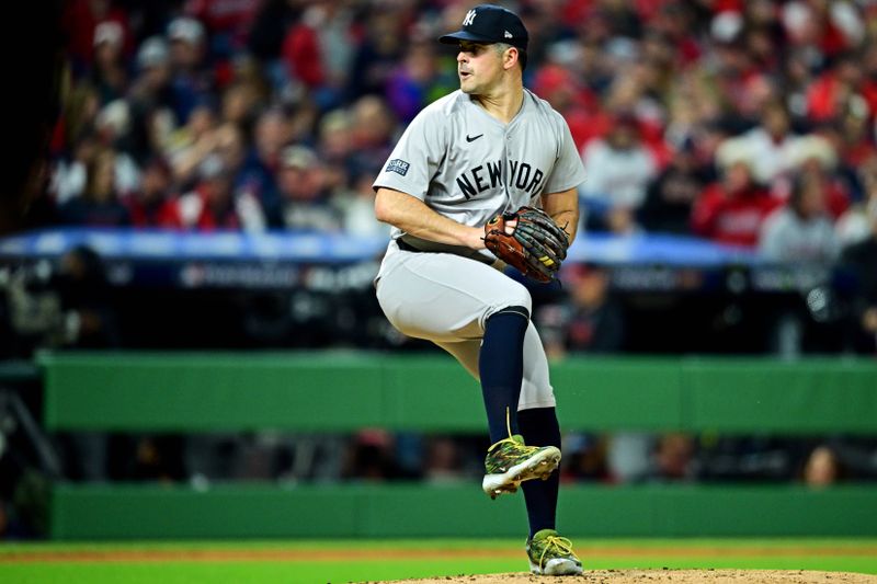 Oct 19, 2024; Cleveland, Ohio, USA; New York Yankees pitcher Carlos Rodón (55) pitches against the Cleveland Guardians during the first inning during game five of the ALCS for the 2024 MLB playoffs at Progressive Field. Mandatory Credit: David Dermer-Imagn Images