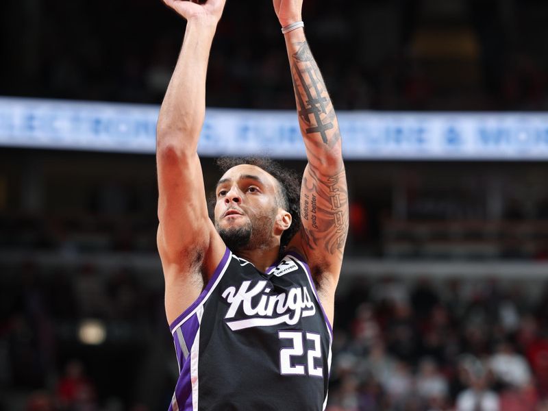 CHICAGO, IL - JANUARY 12: Devin Carter #22 of the Sacramento Kings free throw during the game against the Chicago Bulls  on January 12, 2025 at United Center in Chicago, Illinois. NOTE TO USER: User expressly acknowledges and agrees that, by downloading and or using this photograph, User is consenting to the terms and conditions of the Getty Images License Agreement. Mandatory Copyright Notice: Copyright 2025 NBAE (Photo by Jeff Haynes/NBAE via Getty Images)