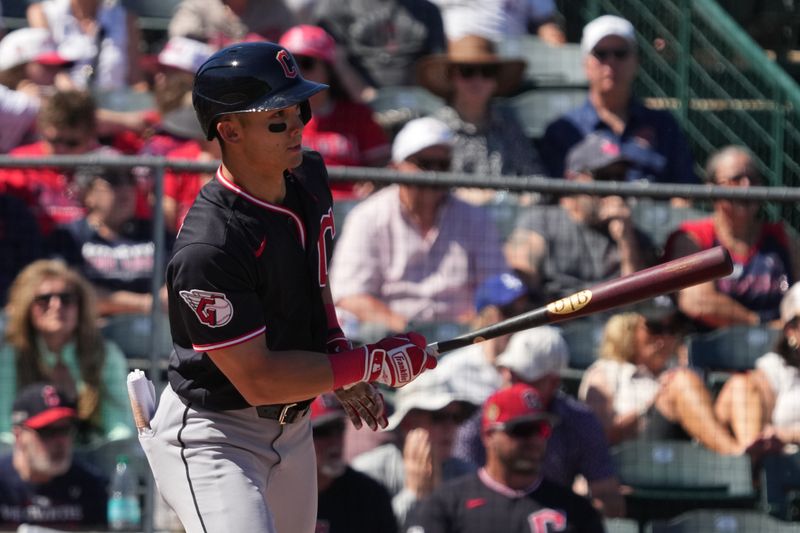 Mar 13, 2026; Tempe, Arizona, USA; Cleveland Guardians right fielder Stuart Fairchild (17) hits against the Los Angeles Angels in the second inning at Tempe Diablo Stadium. Mandatory Credit: Rick Scuteri-Imagn Images