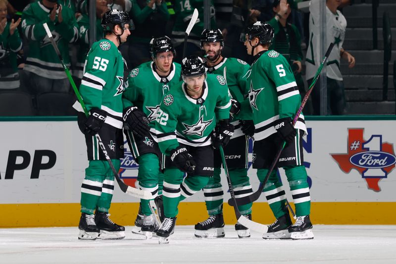 Oct 16, 2025; Dallas, Texas, USA; Dallas Stars center Mavrik Bourque (22) celebrates with teammates aftger scoring a goal against the Vancouver Canucks during the first period at American Airlines Center. Mandatory Credit: Chris Jones-Imagn Images