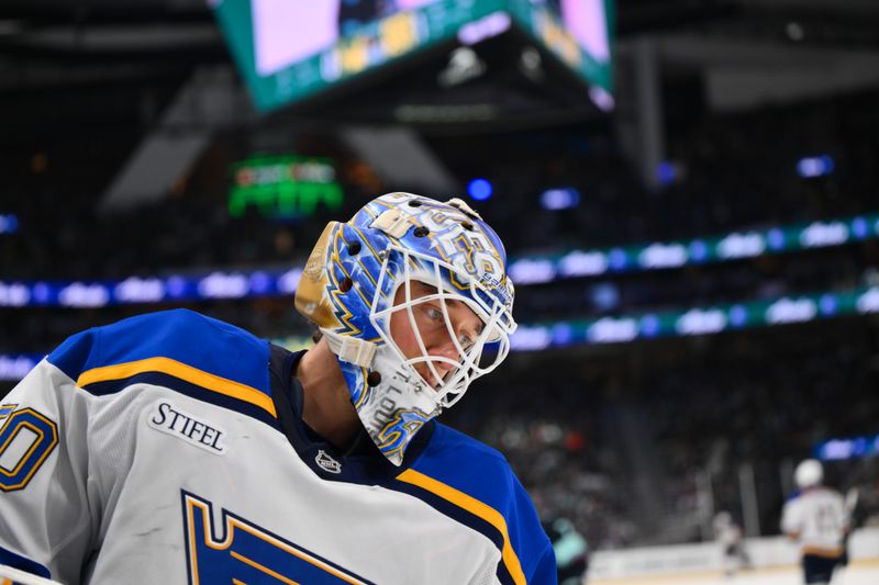 Apr 12, 2025; Seattle, Washington, USA; St. Louis Blues goaltender Jordan Binnington (50) during the second period against the Seattle Kraken at Climate Pledge Arena. Mandatory Credit: Steven Bisig-Imagn Images
