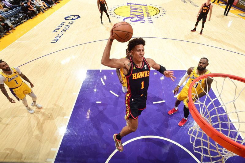 LOS ANGELES, CA - MARCH 18:  Jalen Johnson #1 of the Atlanta Hawks goes to the basket during the game on March 18, 2024 at Crypto.Com Arena in Los Angeles, California. NOTE TO USER: User expressly acknowledges and agrees that, by downloading and/or using this Photograph, user is consenting to the terms and conditions of the Getty Images License Agreement. Mandatory Copyright Notice: Copyright 2024 NBAE (Photo by Adam Pantozzi/NBAE via Getty Images)