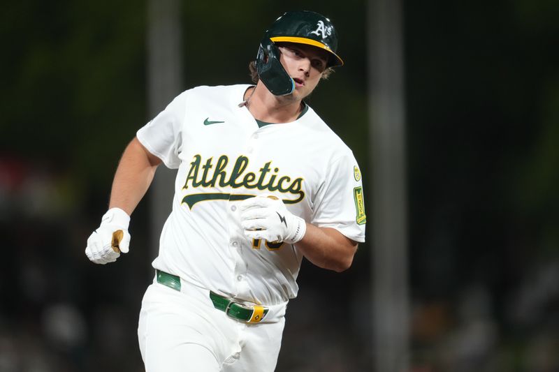 May 21, 2025; West Sacramento, California, USA; Athletics first baseman Nick Kurtz (16) rounds third bases after hitting a home run against the Los Angeles Angels in the seventh inning at Sutter Health Park. Mandatory Credit: Cary Edmondson-Imagn Images