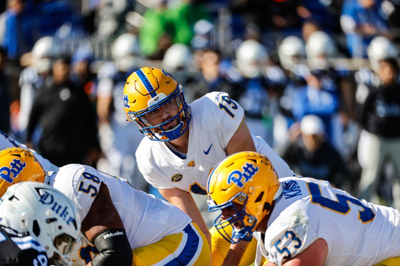 Nov 25, 2023; Durham, North Carolina, USA; Pittsburgh Panthers quarterback Nate Yarnell (19) looks back at the sidelines during the first half of the game against Duke Blue Devils at Wallace Wade Stadium. Mandatory Credit: Jaylynn Nash-USA TODAY Sports