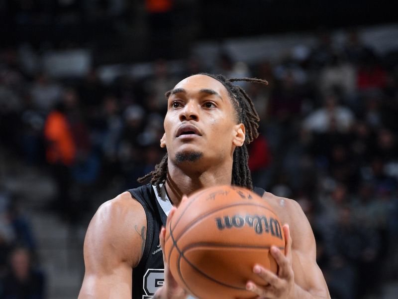 SAN ANTONIO, TX - DECEMBER 5: Devin Vassell #24 of the San Antonio Spurs shoots a free throw during the game against the Chicago Bulls on December 5, 2024 at the Frost Bank Center in San Antonio, Texas. NOTE TO USER: User expressly acknowledges and agrees that, by downloading and or using this photograph, user is consenting to the terms and conditions of the Getty Images License Agreement. Mandatory Copyright Notice: Copyright 2024 NBAE (Photos by Michael Gonzales/NBAE via Getty Images)