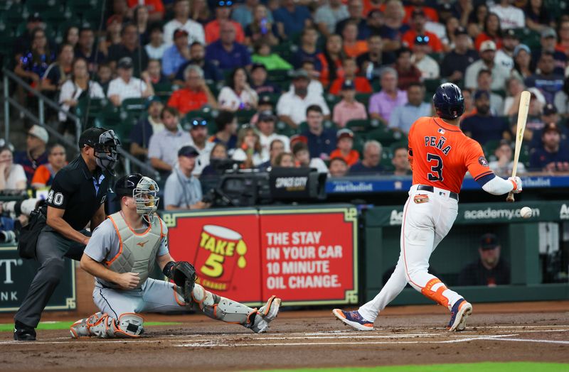 Jun 14, 2024; Houston, Texas, USA; Houston Astros shortstop Jeremy Pena (3) gets hit by a pitch against the Detroit Tigers in the first inning at Minute Maid Park. Mandatory Credit: Thomas Shea-USA TODAY Sports