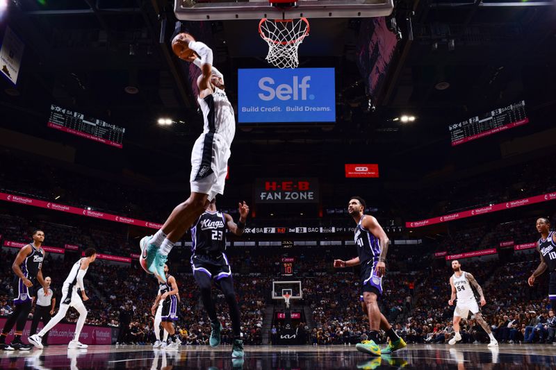 SAN ANTONIO, TX - NOVEMBER 11: Keldon Johnson #0 of the San Antonio Spurs dunks the ball during the game against the Sacramento Kings on November 11, 2024 at the Frost Bank Center in San Antonio, Texas. NOTE TO USER: User expressly acknowledges and agrees that, by downloading and or using this photograph, user is consenting to the terms and conditions of the Getty Images License Agreement. Mandatory Copyright Notice: Copyright 2024 NBAE (Photos by Garrett Ellwood/NBAE via Getty Images)