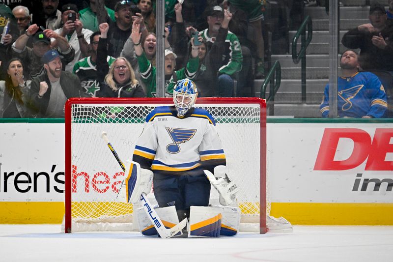 Apr 17, 2024; Dallas, Texas, USA; St. Louis Blues goaltender Jordan Binnington (50) reacts to giving up a goal to Dallas Stars left wing Jason Robertson (21)during the overtime shootout at the American Airlines Center. Mandatory Credit: Jerome Miron-USA TODAY Sports