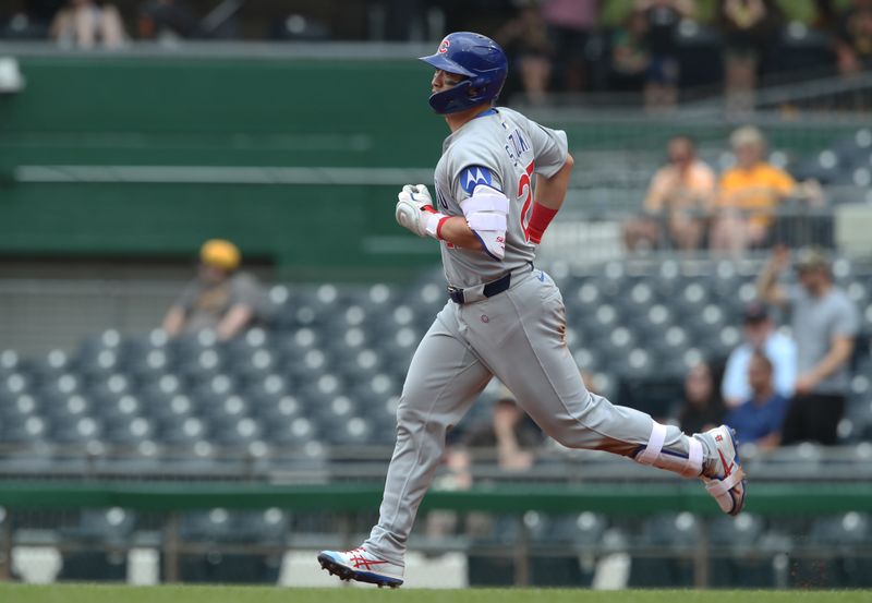 May 1, 2025; Pittsburgh, Pennsylvania, USA;  Chicago Cubs designated hitter Seiya Suzuki (27) circles the bases on a solo home run against the Pittsburgh Pirates during the fifth inning at PNC Park. Mandatory Credit: Charles LeClaire-Imagn Images