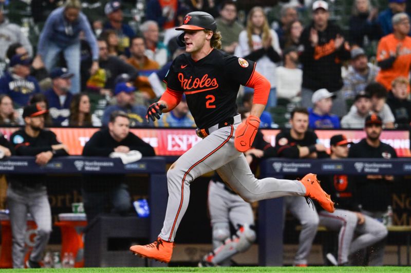 May 21, 2025; Milwaukee, Wisconsin, USA; Baltimore Orioles shortstop Gunnar Henderson (2) scores a run in the eighth inning against the Milwaukee Brewers at American Family Field. Mandatory Credit: Benny Sieu-Imagn Images