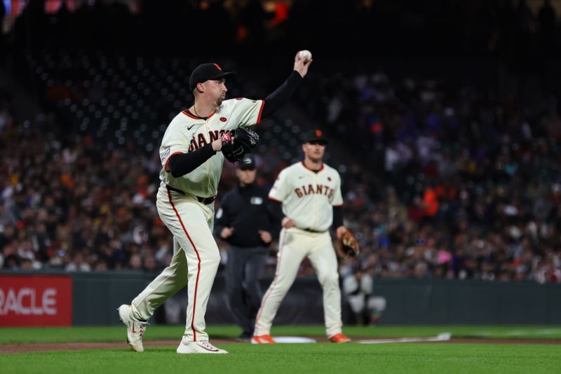 Aug 12, 2024; San Francisco, California, USA; San Francisco Giants pitcher Blake Snell (7) throws to first base during the seventh inning against the Atlanta Braves at Oracle Park. Mandatory Credit: Sergio Estrada-USA TODAY Sports