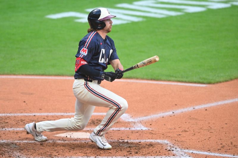 Jun 18, 2024; Cleveland, Ohio, USA; Cleveland Guardians center fielder Daniel Schneemann (10) grounds in to a fielder’s choice while knocking in a run in the second inning against the Seattle Mariners at Progressive Field. Mandatory Credit: David Richard-USA TODAY Sports