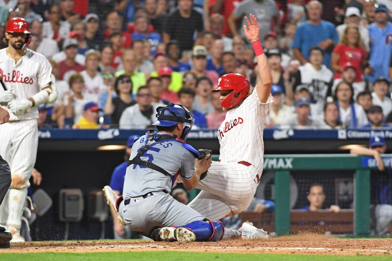 Jul 10, 2024; Philadelphia, Pennsylvania, USA; Philadelphia Phillies third base Alec Bohm (28) is tagged out at home by Los Angeles Dodgers catcher Austin Barnes (15) during the fifth inning at Citizens Bank Park. Mandatory Credit: Eric Hartline-USA TODAY Sports