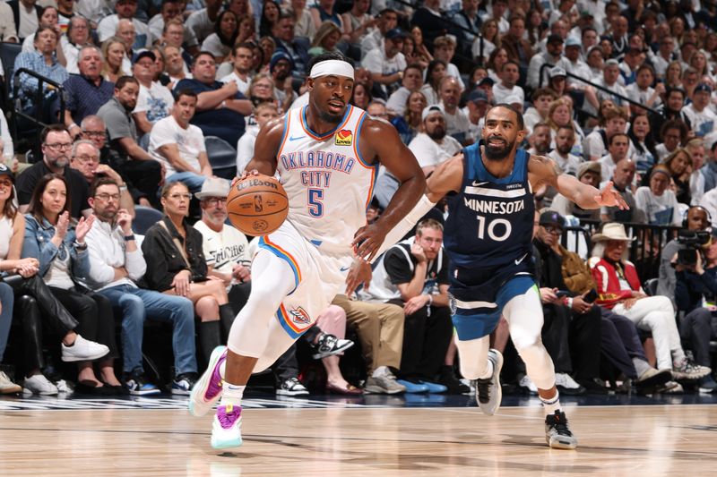 MINNEAPOLIS, MN - MAY 26: Luguentz Dort #5 of the Oklahoma City Thunder drives to the basket during the game against the Minnesota Timberwolves during Game Four of the Western Conference Finals on February 1, 2025 at Target Center in Minneapolis, Minnesota. NOTE TO USER: User expressly acknowledges and agrees that, by downloading and or using this Photograph, user is consenting to the terms and conditions of the Getty Images License Agreement. Mandatory Copyright Notice: Copyright 2025 NBAE (Photo by David Sherman/NBAE via Getty Images)