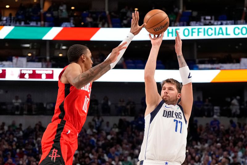 DALLAS, TEXAS - APRIL 07: Luka Doncic #77 of the Dallas Mavericks shoots as Jabari Smith Jr. #10 of the Houston Rockets defends during the first half at American Airlines Center on April 07, 2024 in Dallas, Texas. NOTE TO USER: User expressly acknowledges and agrees that, by downloading and or using this photograph, User is consenting to the terms and conditions of the Getty Images License Agreement. (Photo by Sam Hodde/Getty Images)