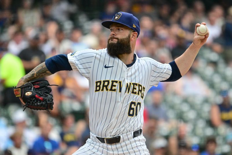 Jul 13, 2024; Milwaukee, Wisconsin, USA; Milwaukee Brewers starting pitcher Dallas Keuchel (60) pitches against the Washington Nationals in the first inning at American Family Field. Mandatory Credit: Benny Sieu-USA TODAY Sports