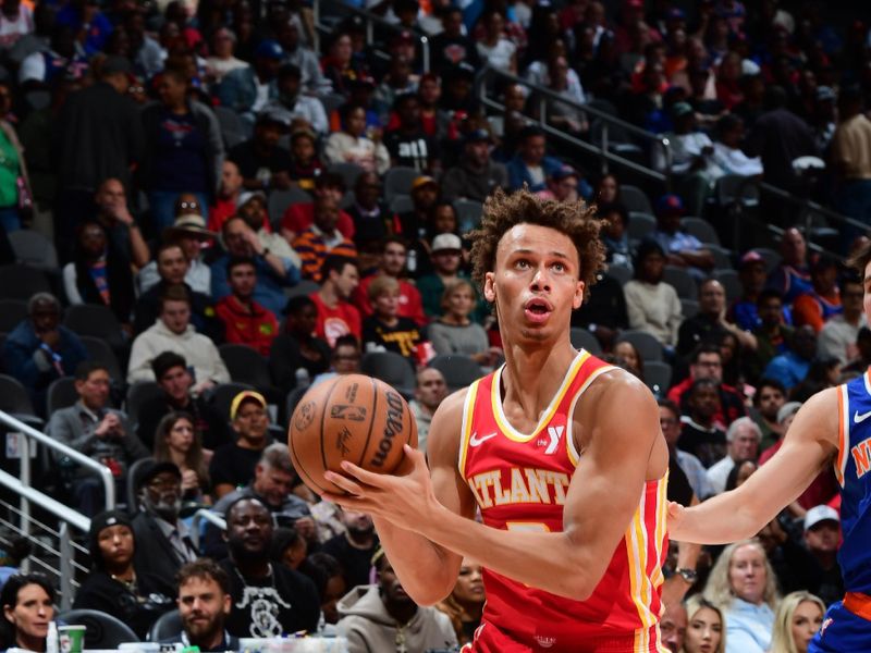 ATLANTA, GA - NOVEMBER 6:  Dyson Daniels #5 of the Atlanta Hawks drives to the basket during the game  against the New York Knicks during a regular season game on November 6, 2024 at State Farm Arena in Atlanta, Georgia.  NOTE TO USER: User expressly acknowledges and agrees that, by downloading and/or using this Photograph, user is consenting to the terms and conditions of the Getty Images License Agreement. Mandatory Copyright Notice: Copyright 2024 NBAE (Photo by Scott Cunningham/NBAE via Getty Images)