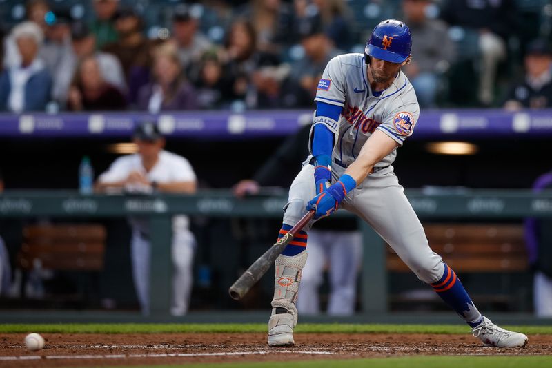 May 26, 2023; Denver, Colorado, USA; New York Mets second baseman Jeff McNeil (1) hits a single in the fifth inning against the Colorado Rockies at Coors Field. Mandatory Credit: Isaiah J. Downing-USA TODAY Sports