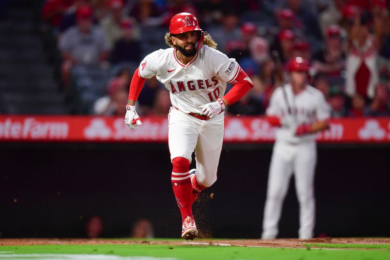 Sep 27, 2024; Anaheim, California, USA; Los Angeles Angels shortstop Jack Lopez (10) runs after hitting a double against the Texas Rangers during the first inning at Angel Stadium. Mandatory Credit: Gary A. Vasquez-Imagn Images