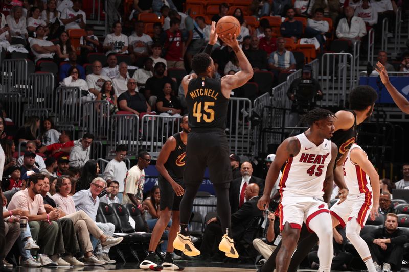 MIAMI, FL - APRIL 28:  Donovan Mitchell #45 of the Cleveland Cavaliers shoots the ball during the game against the Miami Heat during Round 1 Game 4 on April 28, 2025 at Kaseya Center in Miami, Florida. NOTE TO USER: User expressly acknowledges and agrees that, by downloading and or using this Photograph, user is consenting to the terms and conditions of the Getty Images License Agreement. Mandatory Copyright Notice: Copyright 2025 NBAE (Photo by Issac Baldizon/NBAE via Getty Images)