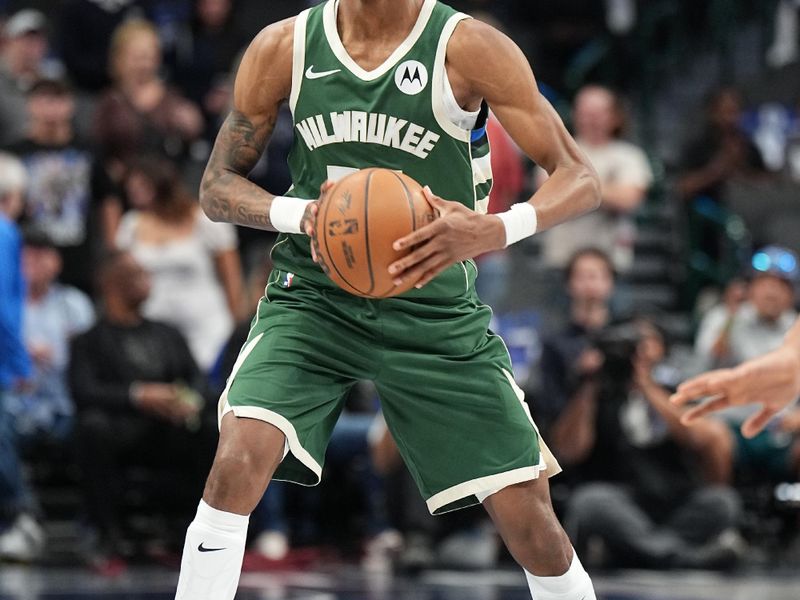 DALLAS, TX - OCTOBER 17: AJ Johnson #77 of the Milwaukee Bucks handles the ball during the game against the Dallas Mavericks during a NBA preseason game on October 17, 2024 at American Airlines Center in Dallas, Texas. NOTE TO USER: User expressly acknowledges and agrees that, by downloading and or using this photograph, User is consenting to the terms and conditions of the Getty Images License Agreement. Mandatory Copyright Notice: Copyright 2024 NBAE (Photo by Glenn James/NBAE via Getty Images)