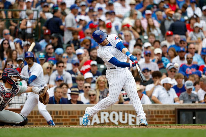 Jul 4, 2024; Chicago, Illinois, USA; Chicago Cubs outfielder Ian Happ (8) hits a three-run home run against the Philadelphia Phillies during the fourth inning at Wrigley Field. Mandatory Credit: Kamil Krzaczynski-USA TODAY Sports