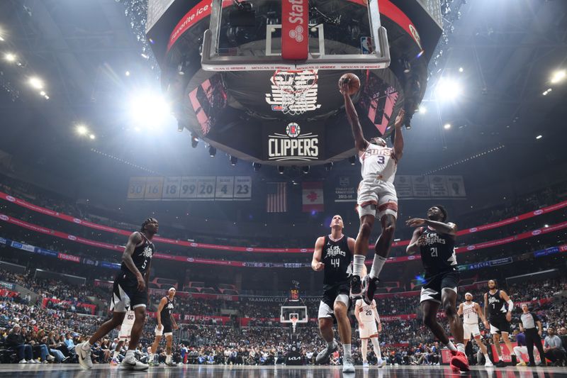 LOS ANGELES, CA - APRIL 10: Bradley Beal #3 of the Phoenix Suns drives to the basket during the game against the Los Angeles Lakers on April 10, 2024 at Crypto.Com Arena in Los Angeles, California. NOTE TO USER: User expressly acknowledges and agrees that, by downloading and/or using this Photograph, user is consenting to the terms and conditions of the Getty Images License Agreement. Mandatory Copyright Notice: Copyright 2024 NBAE (Photo by Adam Pantozzi/NBAE via Getty Images)