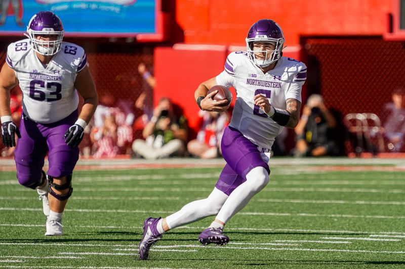 Oct 21, 2023; Lincoln, Nebraska, USA; Northwestern Wildcats quarterback Brendan Sullivan (6) runs the ball against the Nebraska Cornhuskers during the first quarter at Memorial Stadium. Mandatory Credit: Dylan Widger-USA TODAY Sports