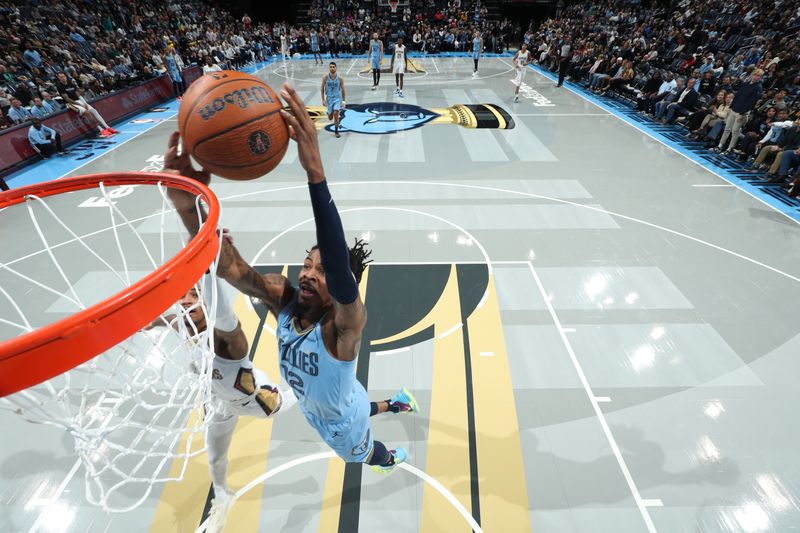 MEMPHIS, TN - NOVEMBER 29: Ja Morant #12 of the Memphis Grizzlies drives to the basket during the game against the New Orleans Pelicans during the Emirates NBA Cup game on November 29, 2024 at FedExForum in Memphis, Tennessee. NOTE TO USER: User expressly acknowledges and agrees that, by downloading and or using this photograph, User is consenting to the terms and conditions of the Getty Images License Agreement. Mandatory Copyright Notice: Copyright 2024 NBAE (Photo by Joe Murphy/NBAE via Getty Images)