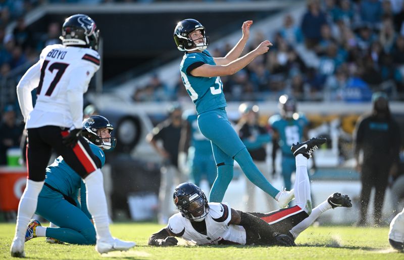 Jacksonville Jaguars place kicker Cam Little (39) misses a field goal against the Houston Texans during the second half of an NFL football game Sunday, Dec. 1, 2024, in Jacksonville, Fla. (AP Photo/Phelan M. Ebenhack)