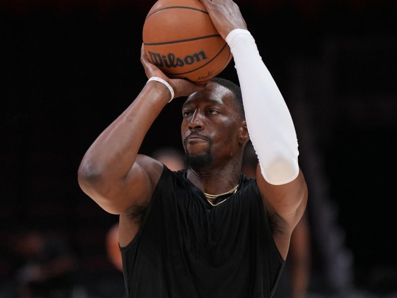 MIAMI, FL - OCTOBER 15: Bam Adebayo #13 of the Miami Heat warms up before the game against the San Antonio Spurs during a NBA preseason game on October 15, 2024 at Kaseya Center in Miami, Florida. NOTE TO USER: User expressly acknowledges and agrees that, by downloading and or using this Photograph, user is consenting to the terms and conditions of the Getty Images License Agreement. Mandatory Copyright Notice: Copyright 2024 NBAE (Photo by Jesse D. Garrabrant/NBAE via Getty Images)