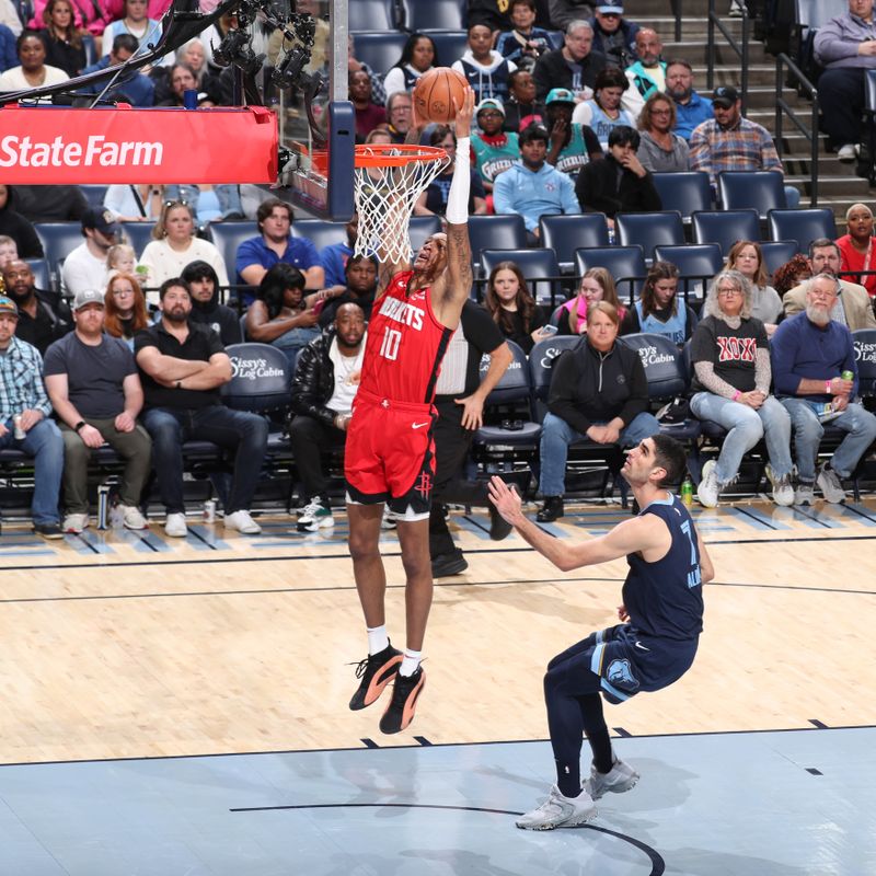 MEMPHIS, TN - FEBRUARY 14: Jabari Smith Jr. #10 of the Houston Rockets dunks the ball during the game against the Memphis Grizzlies on February 14, 2024 at FedExForum in Memphis, Tennessee. NOTE TO USER: User expressly acknowledges and agrees that, by downloading and or using this photograph, User is consenting to the terms and conditions of the Getty Images License Agreement. Mandatory Copyright Notice: Copyright 2024 NBAE (Photo by Joe Murphy/NBAE via Getty Images)