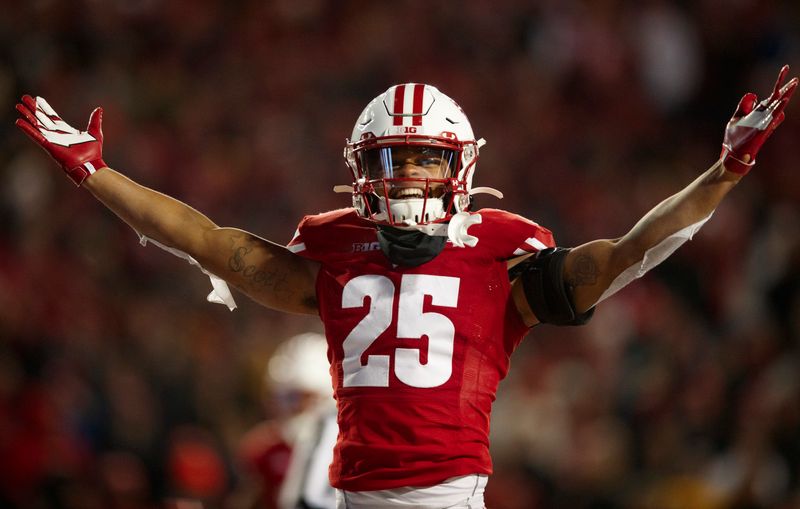 Nov 9, 2019; Madison, WI, USA; Wisconsin Badgers safety Eric Burrell (25) celebrates after a failed two point conversion by the Iowa Hawkeyes during the fourth quarter at Camp Randall Stadium. Mandatory Credit: Jeff Hanisch-USA TODAY Sports