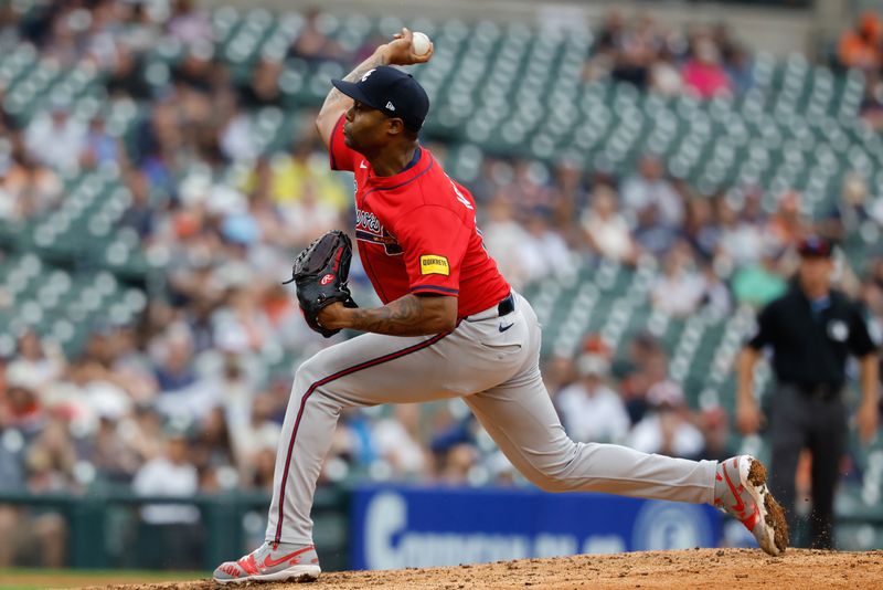Sep 21, 2025; Detroit, Michigan, USA;  Atlanta Braves pitcher Raisel Iglesias (26) pitches in the ninth inning against the Detroit Tigers at Comerica Park. Mandatory Credit: Rick Osentoski-Imagn Images