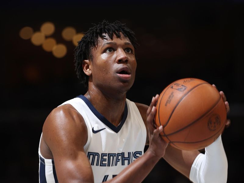 MEMPHIS, TN - APRIL 6: GG Jackson #45 of the Memphis Grizzlies shoots a free throw during the game against the Philadelphia 76ers on April 6, 2024 at FedExForum in Memphis, Tennessee. NOTE TO USER: User expressly acknowledges and agrees that, by downloading and or using this photograph, User is consenting to the terms and conditions of the Getty Images License Agreement. Mandatory Copyright Notice: Copyright 2024 NBAE (Photo by Joe Murphy/NBAE via Getty Images)