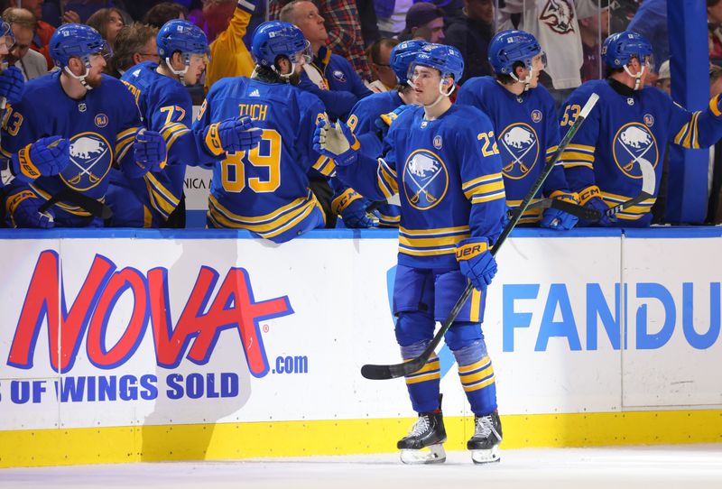 Apr 11, 2024; Buffalo, New York, USA;  Buffalo Sabres right wing Jack Quinn (22) celebrates his goal with teammates during the third period against the Washington Capitals at KeyBank Center. Mandatory Credit: Timothy T. Ludwig-USA TODAY Sports