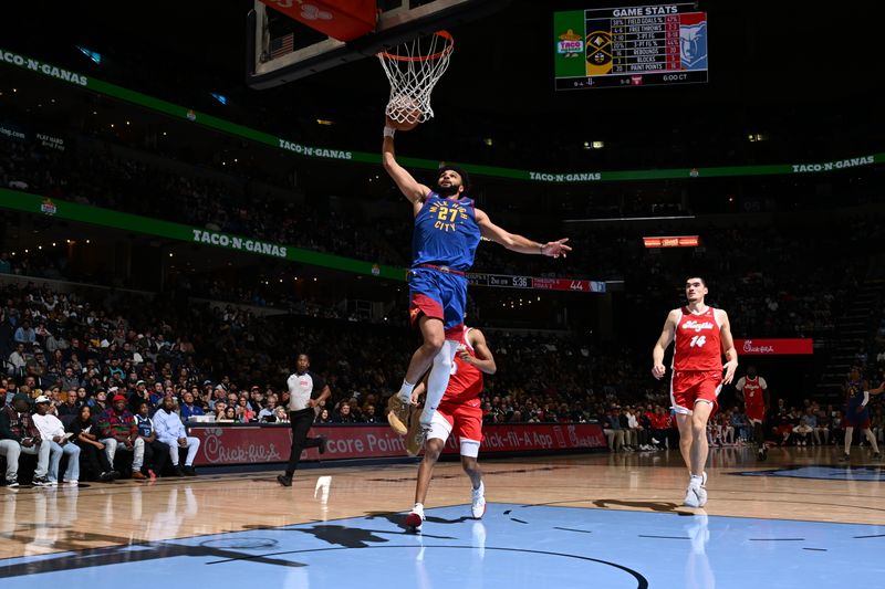 MEMPHIS, TN - NOVEMBER 17:  Jamal Murray #27 of the Denver Nuggets dunks the ball during the game against the Memphis Grizzlies during a regular season game on November 17, 2024 at FedExForum in Memphis, Tennessee. NOTE TO USER: User expressly acknowledges and agrees that, by downloading and or using this photograph, User is consenting to the terms and conditions of the Getty Images License Agreement. Mandatory Copyright Notice: Copyright 2024 NBAE (Photo by Grant Burke/NBAE via Getty Images)