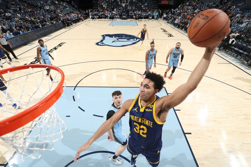 MEMPHIS, TN - FEBRUARY 2: Trayce Jackson-Davis #32 of the Golden State Warriors  drives to the basket during the game against the Memphis Grizzlies on February 2, 2024 at FedExForum in Memphis, Tennessee. NOTE TO USER: User expressly acknowledges and agrees that, by downloading and or using this photograph, User is consenting to the terms and conditions of the Getty Images License Agreement. Mandatory Copyright Notice: Copyright 2024 NBAE (Photo by Joe Murphy/NBAE via Getty Images)