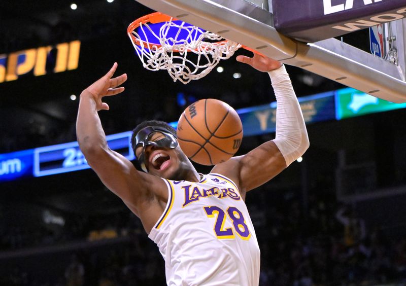 LOS ANGELES, CALIFORNIA - DECEMBER 25: Rui Hachimura #28 of the Los Angeles Lakers reacts after a dunk in the first half against the Boston Celtics at Crypto.com Arena on December 25, 2023 in Los Angeles, California. NOTE TO USER: User expressly acknowledges and agrees that, by downloading and or using this photograph, User is consenting to the terms and conditions of the Getty Images License Agreement.(Photo by Jayne Kamin-Oncea/Getty Images)