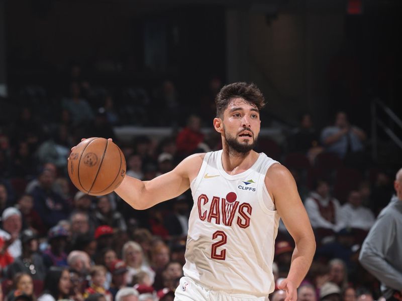 Cleveland, OH - OCTOBER 10: Ty Jerome #2 of the Cleveland Cavaliers dribbles the ball during the game against the Indiana Pacers during a NBA pre season game on October 10, 2024 at Rocket Mortgage Fieldhouse in Cleveland, Ohio. NOTE TO USER: User expressly acknowledges and agrees that, by downloading and or using this photograph, User is consenting to the terms and conditions of the Getty Images License Agreement. Mandatory Copyright Notice: Copyright 2024 NBAE (Photo by Jeff Haynes/NBAE via Getty Images)