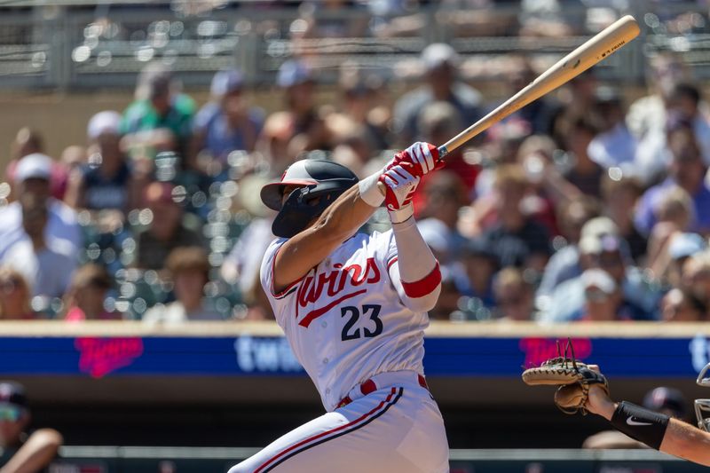 Aug 16, 2023; Minneapolis, Minnesota, USA; Minnesota Twins third baseman Royce Lewis (23) hits a RBI double against the Detroit Tigers in the first inning at Target Field. Mandatory Credit: Jesse Johnson-USA TODAY Sports