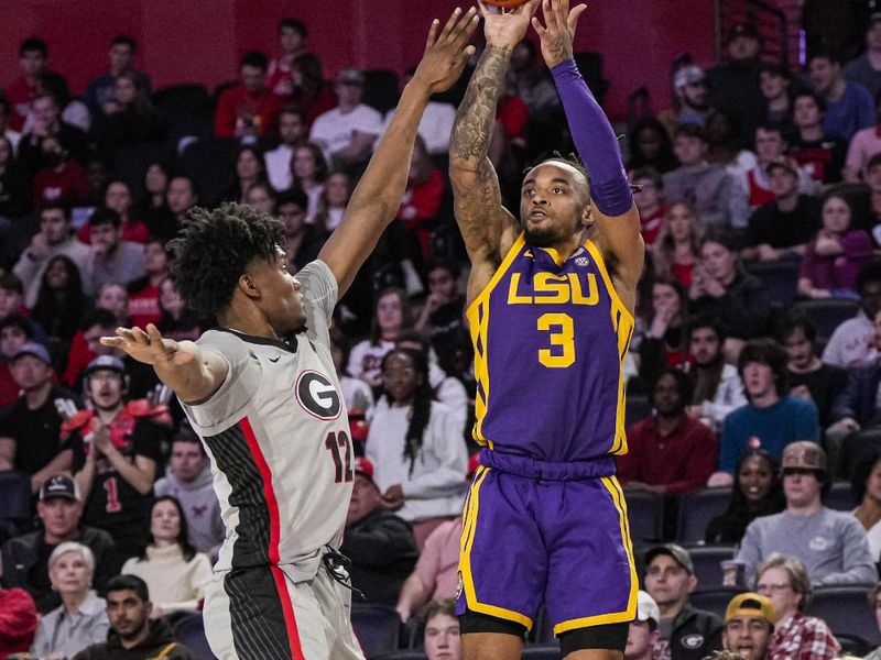 Feb 14, 2023; Athens, Georgia, USA; LSU Tigers guard Justice Hill (3) shoots over Georgia Bulldogs forward Matthew-Alexander Moncrieffe (12) during the first half at Stegeman Coliseum. Mandatory Credit: Dale Zanine-USA TODAY Sports