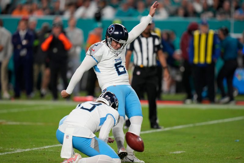 Tennessee Titans place kicker Nick Folk (6) kicks. Afield goal during the second half of an NFL football game against the Miami Dolphins, Monday, Dec. 11, 2023, in Miami. (AP Photo/Lynne Sladky)