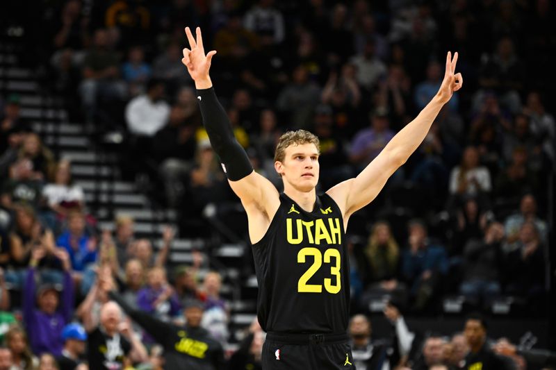 SALT LAKE CITY, UTAH - OCTOBER 23: Lauri Markkanen #23 of the Utah Jazz celebrates a three point basket against the Memphis Grizzlies during the first quarter at Delta Center on October 23, 2024 in Salt Lake City, Utah. NOTE TO USER: User expressly acknowledges and agrees that, by downloading and or using this photograph, User is consenting to the terms and conditions of the Getty Images License Agreement. (Photo by Alex Goodlett/Getty Images)