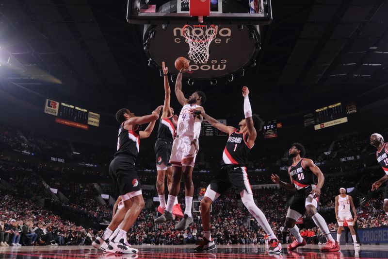 PORTLAND, OR - JANUARY 14: Chimezie Metu #4 of the Phoenix Suns drives to the basket during the game against the Portland Trail Blazers on January 14, 2024 at the Moda Center Arena in Portland, Oregon. NOTE TO USER: User expressly acknowledges and agrees that, by downloading and or using this photograph, user is consenting to the terms and conditions of the Getty Images License Agreement. Mandatory Copyright Notice: Copyright 2024 NBAE (Photo by Cameron Browne/NBAE via Getty Images)