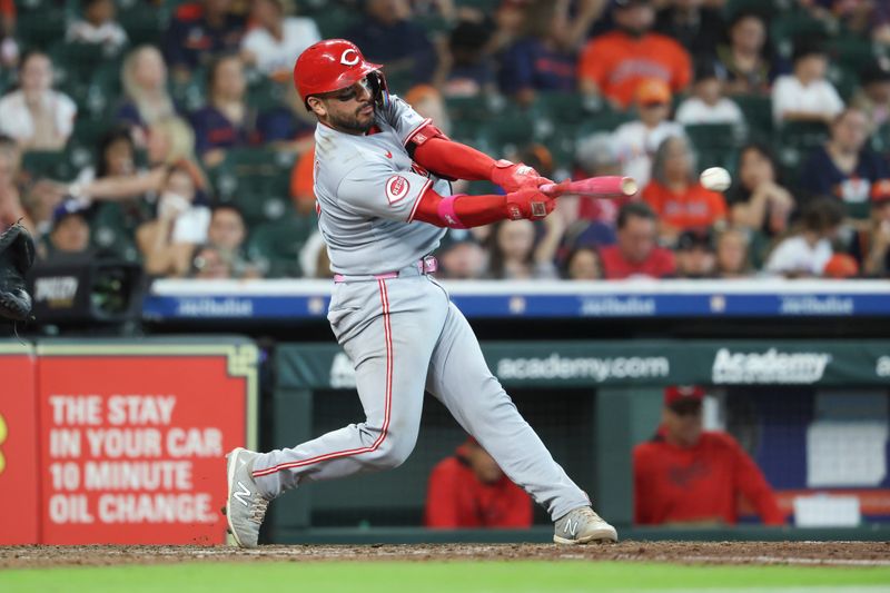 May 11, 2025; Houston, Texas, USA; Cincinnati Reds catcher Jose Trevino (35) hits a double during the eighth inning against the Houston Astros at Daikin Park. Mandatory Credit: Troy Taormina-Imagn Images