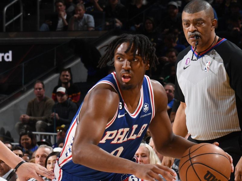 SAN FRANCISCO, CA - MARCH 24: Tyrese Maxey #0 of the Philadelphia 76ers dribbles the ball during the game against the Golden State Warriors on March 24, 2023 at Chase Center in San Francisco, California. NOTE TO USER: User expressly acknowledges and agrees that, by downloading and or using this photograph, user is consenting to the terms and conditions of Getty Images License Agreement. Mandatory Copyright Notice: Copyright 2023 NBAE (Photo by Noah Graham/NBAE via Getty Images)