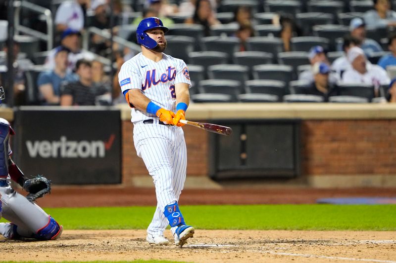 Aug 30, 2023; New York City, New York, USA;  New York Mets right fielder DJ Steward (29) watches his two run home run against the Texas Rangers during the eighth inning at Citi Field. Mandatory Credit: Gregory Fisher-USA TODAY Sports