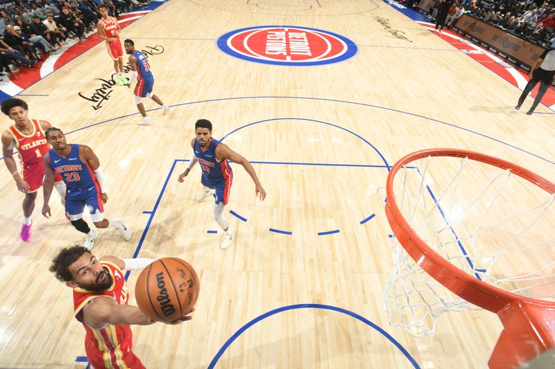 DETROIT, MI - NOVEMBER 8: Trae Young #11 of the Atlanta Hawks shoots the ball during the game against the Detroit Pistons on November  8, 2024 at Little Caesars Arena in Detroit, Michigan. NOTE TO USER: User expressly acknowledges and agrees that, by downloading and/or using this photograph, User is consenting to the terms and conditions of the Getty Images License Agreement. Mandatory Copyright Notice: Copyright 2024 NBAE (Photo by Chris Schwegler/NBAE via Getty Images)